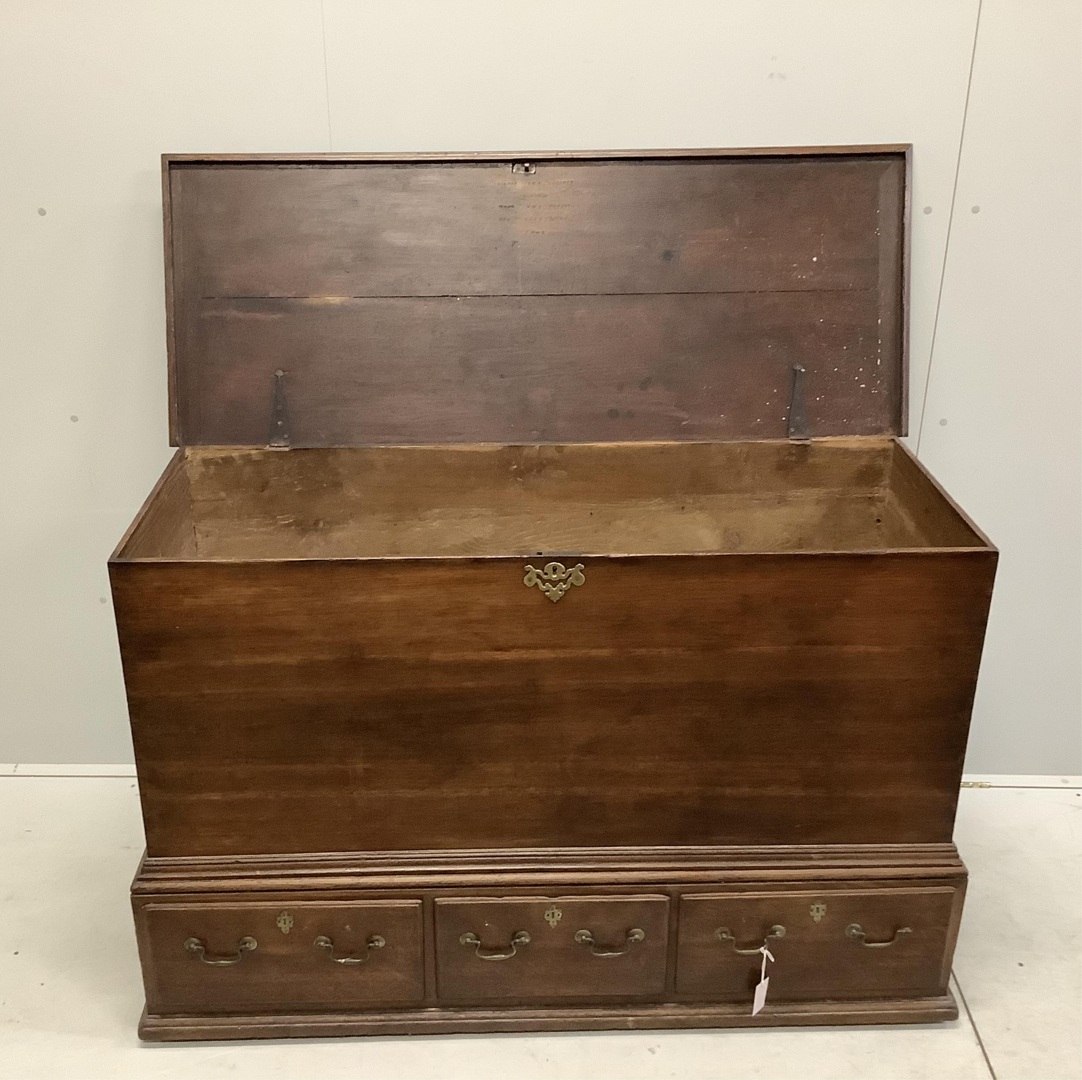 An 18th century oak mule chest, width 143cm, depth 55cm, height 98cm. Condition - fair